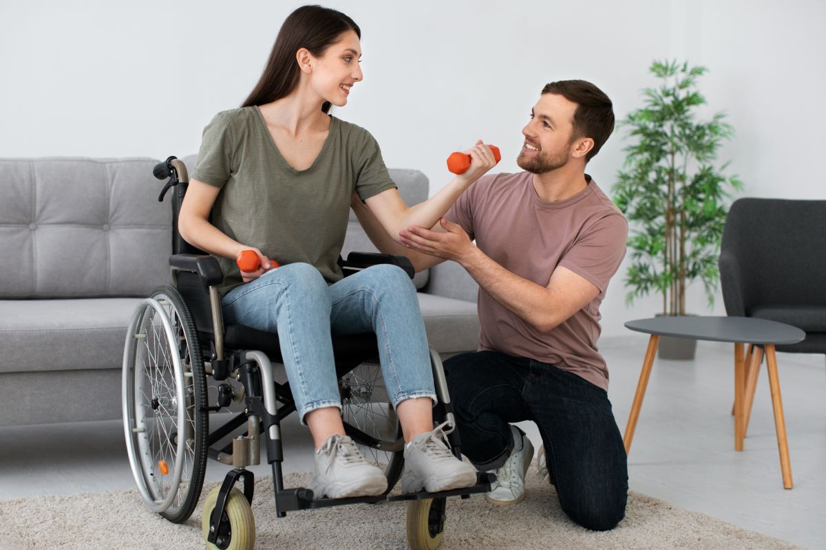 A disability provider working with a patient.